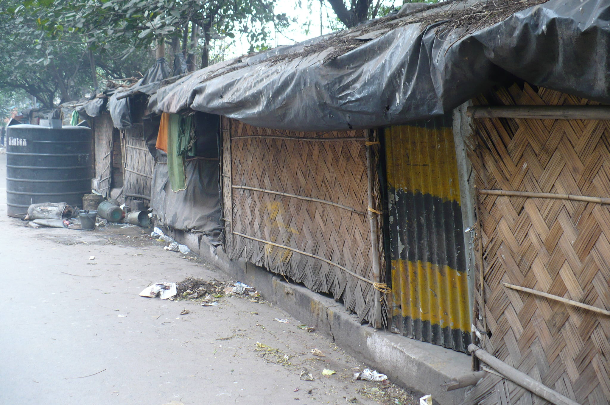 hovels opposite the swank SBI building